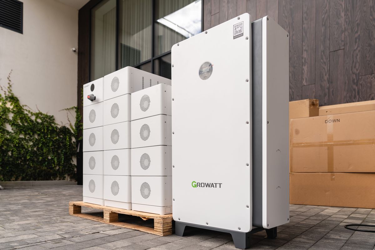 Growatt battery modules and an inverter at the entrance to the launch venue